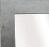 A close-up view of the corner of a mirror with a gray frame. Náhled obrázku produktu