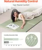 A woman lying on a green tatami mat, with a graphic showing humidity absorption rates. Anteprima dell’immagine prodotto
