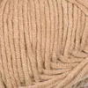 A close-up, textured view of beige yarn. Podgląd zdjęcia produktu