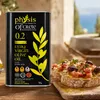 Olivenöldose neben Bruschetta mit Tomaten auf rustikalem Tisch Produktbild-Vorschau