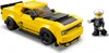 A yellow LEGO Dodge Challenger SRT Demon and a LEGO minifigure dressed as a race car driver are shown on a white background. Náhled obrázku produktu