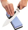 Hands sharpening a knife on a whetstone. Produktbild-Vorschau