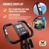 Close-up of the handlebars and display of a stationary exercise bike, with marketing text and feature callouts. Produktbild-Vorschau
