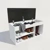 A white shoe cabinet with a black upholstered lid, open to reveal storage compartments and shoes. Náhľad obrázku produktu