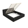 A black upholstered bed frame with its slatted base lifted, revealing storage space underneath. The background is plain white. Produktbild-Vorschau