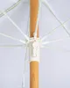 Close-up of the mechanism and wooden pole of an open umbrella. Náhľad obrázku produktu