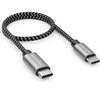 A braided USB-C to Micro USB cable with metallic connectors, shown against a white background. Produktbild-Vorschau