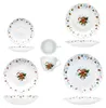 A collection of Christmas-themed tableware with gingerbread man and snowflake designs. Náhled obrázku produktu