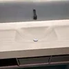 A close-up view of a modern bathroom sink and faucet. Anteprima dell’immagine prodotto