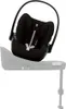 A black baby car seat is shown attached to its base, which is mounted on a stand. Podgląd zdjęcia produktu