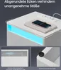 A close-up marketing image of a white nightstand with blue LED lighting, a phone charging on top, and integrated power outlets. Produktbild-Vorschau
