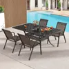 A patio dining set with chairs and a table is set up next to a swimming pool. Náhľad obrázku produktu