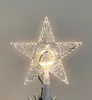 A close-up of a star-shaped Christmas tree topper with integrated LED lights. Anteprima dell’immagine prodotto
