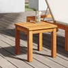 A wooden side table with a drink on it, placed on a wooden deck next to a lounge chair. Anteprima dell’immagine prodotto
