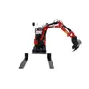 A red and black mini excavator with a bucket and tracks is shown on a white background with two black fork attachments in the foreground. Produktbild-Vorschau