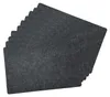 A stack of dark gray placemats. Produktbild-Vorschau