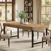 A dining room scene with a wooden table and chairs. Náhľad obrázku produktu