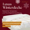 A close-up view of a white winter duvet on a bed, with text overlays and snowflake graphics. Produktbild-Vorschau