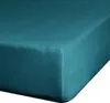 A close-up view of a teal fitted sheet on a mattress. Produktbild-Vorschau