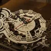 A close-up shot of a wooden mechanical clock with Roman numerals. Produktbild-Vorschau
