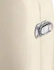 A close-up of a metal latch on a cream-colored surface. Náhled obrázku produktu