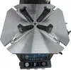 A tire changing machine with four clamping arms. Produktbild-Vorschau