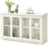 A white sideboard cabinet with glass sliding doors, displaying various kitchen items and decorative elements on top. Podgląd zdjęcia produktu