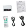 A collection of items related to a music digitizer, including the device itself, a remote control, cables, and an instruction manual. Podgląd zdjęcia produktu