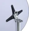 Underside of a round table with a folding mechanism and a central support pole. Produktbild-Vorschau