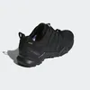 A black Adidas Terrex hiking shoe is shown from a side-rear angle against a white background. Anteprima dell’immagine prodotto