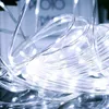 A close-up view of a tangled string of white LED lights. Náhled obrázku produktu