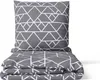 A folded duvet cover and pillowcase set with a geometric pattern. Produktbild-Vorschau