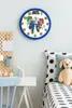 A child's bedroom with a desk and bed, featuring a Super Mario clock on the wall. Produktbild-Vorschau