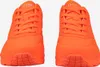 A pair of bright orange Skechers sneakers are shown from the front against a white background. Anteprima dell’immagine prodotto