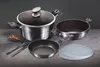 A set of cookware, including a pot with a lid, a frying pan, and a saucepan, arranged on a dark surface with some chili peppers and tongs. Produktbild-Vorschau
