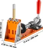 A close-up, angled view of an orange and silver pocket hole jig kit on a white background, with measurement indicators. Náhled obrázku produktu
