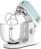 A light blue and white stand mixer with a glass bowl and beater attachment, shown from a side-angle against a white background. Produktbild-Vorschau