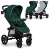 A dark green baby stroller is shown from the front and side, with two other strollers in the background, one with a mosquito net. Náhled obrázku produktu