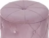 A close-up view of a pink upholstered ottoman. Náhled obrázku produktu