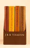 A set of four books by J.R.R. Tolkien, including 'The Hobbit' and 'The Lord of the Rings' trilogy, displayed in a brown slipcase. Produktbild-Vorschau