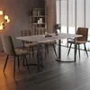 A dining set with a rectangular table and four chairs in a modern dining room setting. Voir les images du produit