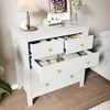 A white dresser with several drawers open, displaying various items inside, set in a room with a lamp and artwork. Náhled obrázku produktu