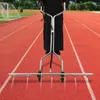 A person is using a pressure washer attachment on a running track. Produktbild-Vorschau