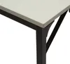 A close-up view of the corner of a desk, showing the tabletop and a leg. Produktbild-Vorschau