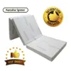 A folded mattress with promotional badges. Náhľad obrázku produktu