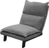 A gray floor chair with a tufted back and seat, shown from a slightly elevated side angle against a white background. Podgląd zdjęcia produktu