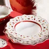 A close-up view of stacked Villeroy & Boch Toy's Delight soup plates with a festive holiday pattern. Podgląd zdjęcia produktu