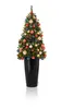 A decorated Christmas tree in a black planter. Produktbild-Vorschau