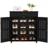 A black shoe cabinet with its doors open, displaying multiple shelves filled with shoes. A white handbag and a small vase of flowers are on top of the cabinet. Produktbild-Vorschau