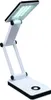 A white LED desk lamp with a black base and accents, shown in an upright, functional position against a white background. Produktbild-Vorschau